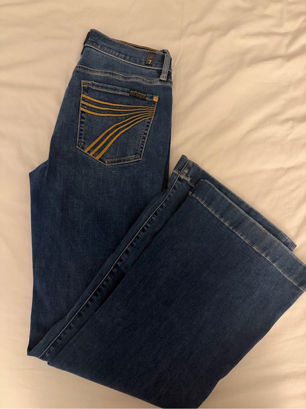 7 For All Mankind Dark Blue Flare Jeans with Gold Pocket Stitching